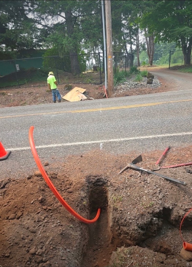 Actual road bore excavation and underground fiber project in Oregon